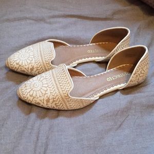 Brown and white flats